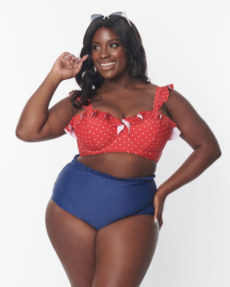 Front of a model wearing a size 3X Unique Vintage Red & White Pin Dot Southampton Swim Top in Red & White Pin Dot by Unique Vintage. | dia_product_style_image_id:331987